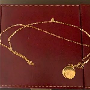 A long locket necklace